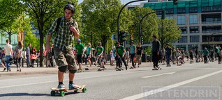 Skater düsen für Umweltschutz durch die City