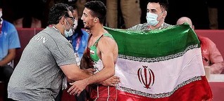 Wrestler Geraei Snatches Iran's Second Olympic Gold as IRGC Marksman Comes Home