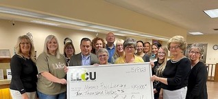 LLCU donates to Nokomis library